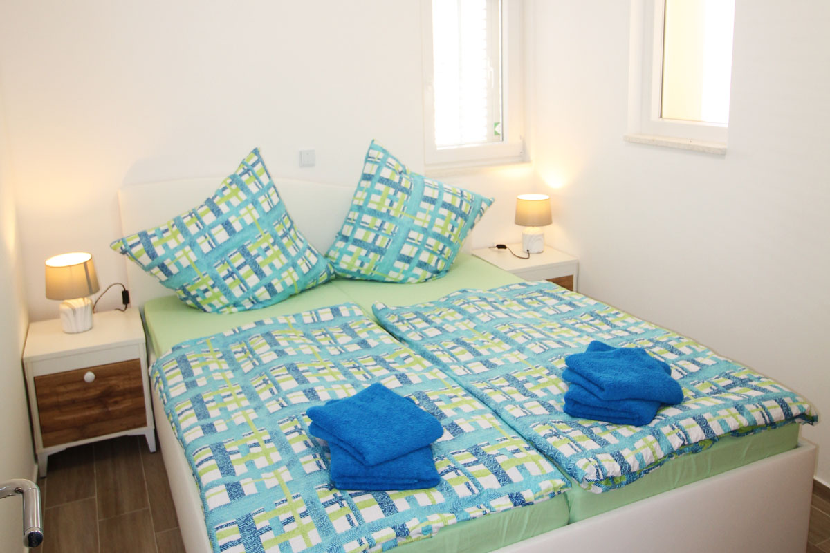 Ferienwohnung im Erdgeschoss - Schlafzimmer2 mit Doppelbett